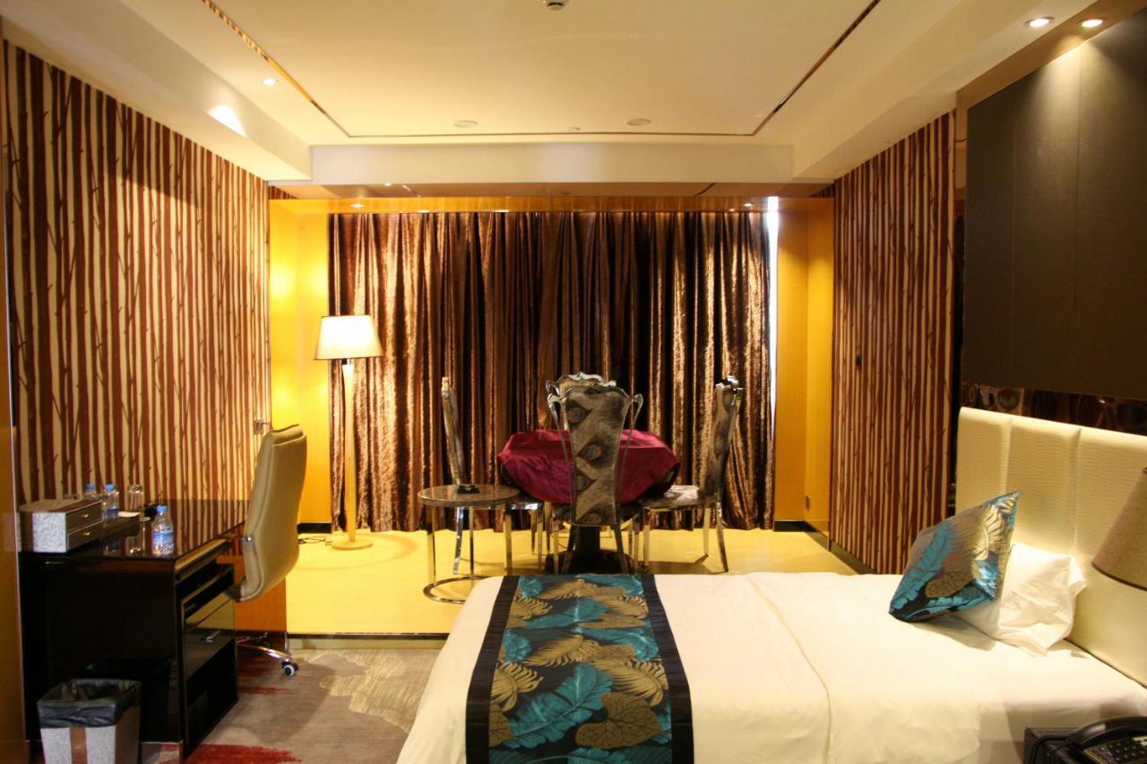 Foshan Sweet World Hotel Quarto foto